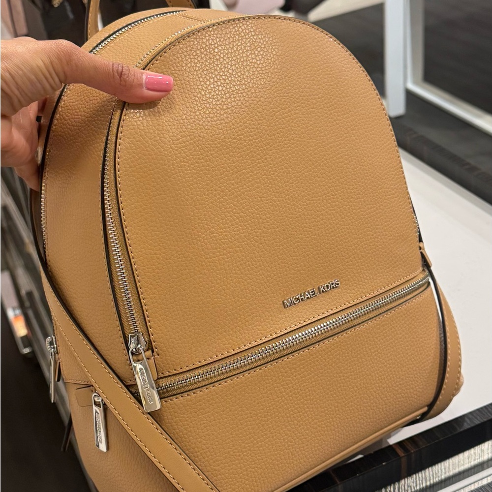 Michael Kors Tan Backpack with Structured Design and Silver Accents